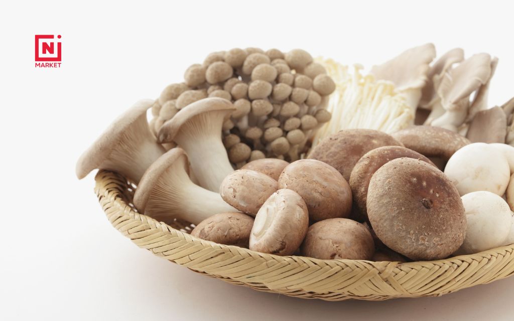 Assorted fresh mushrooms including shiitake, cremini, and oyster varieties for making broth
