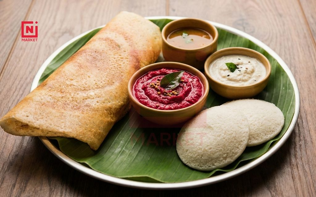 South Indian breakfast with beetroot chutney idli and dosa